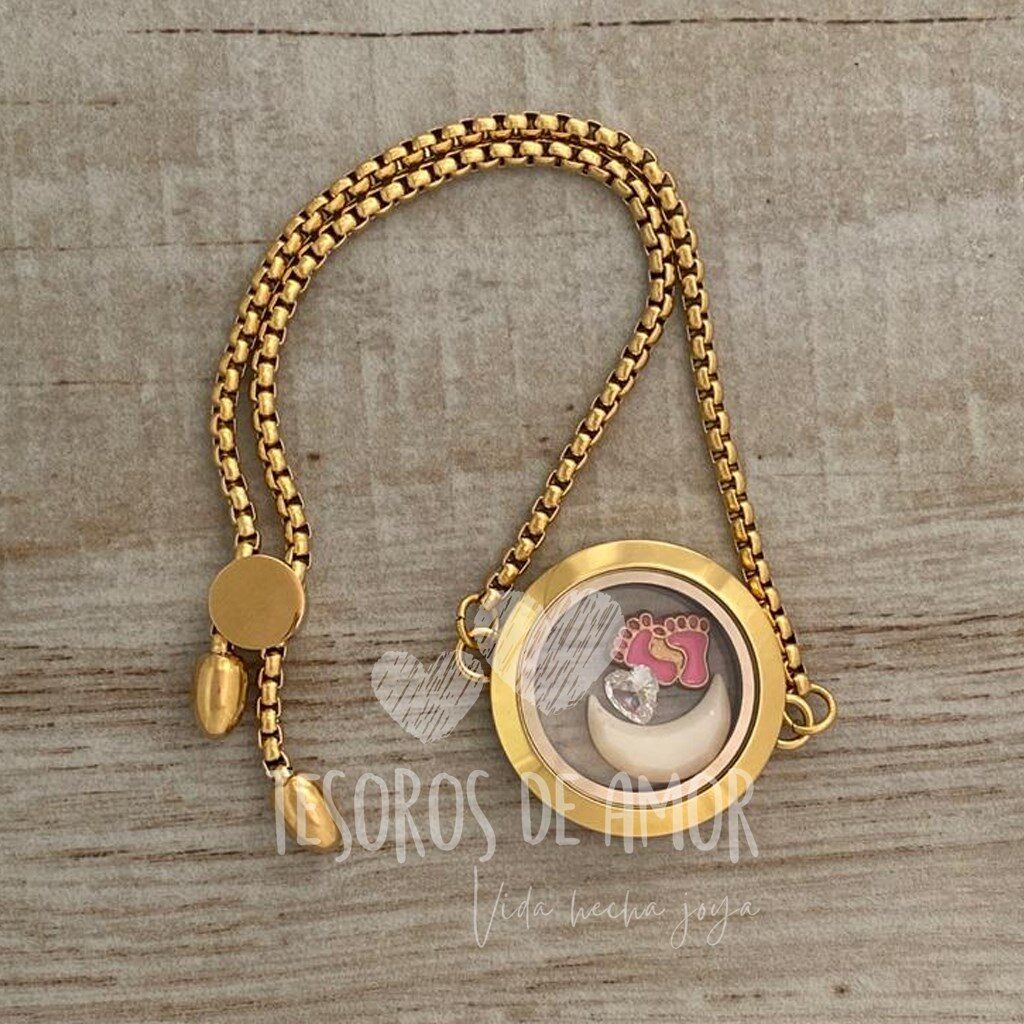 Relicario liso brazalete dorado con figura de leche “luna”, pieza metálica dorada “pie” y piedra del mes