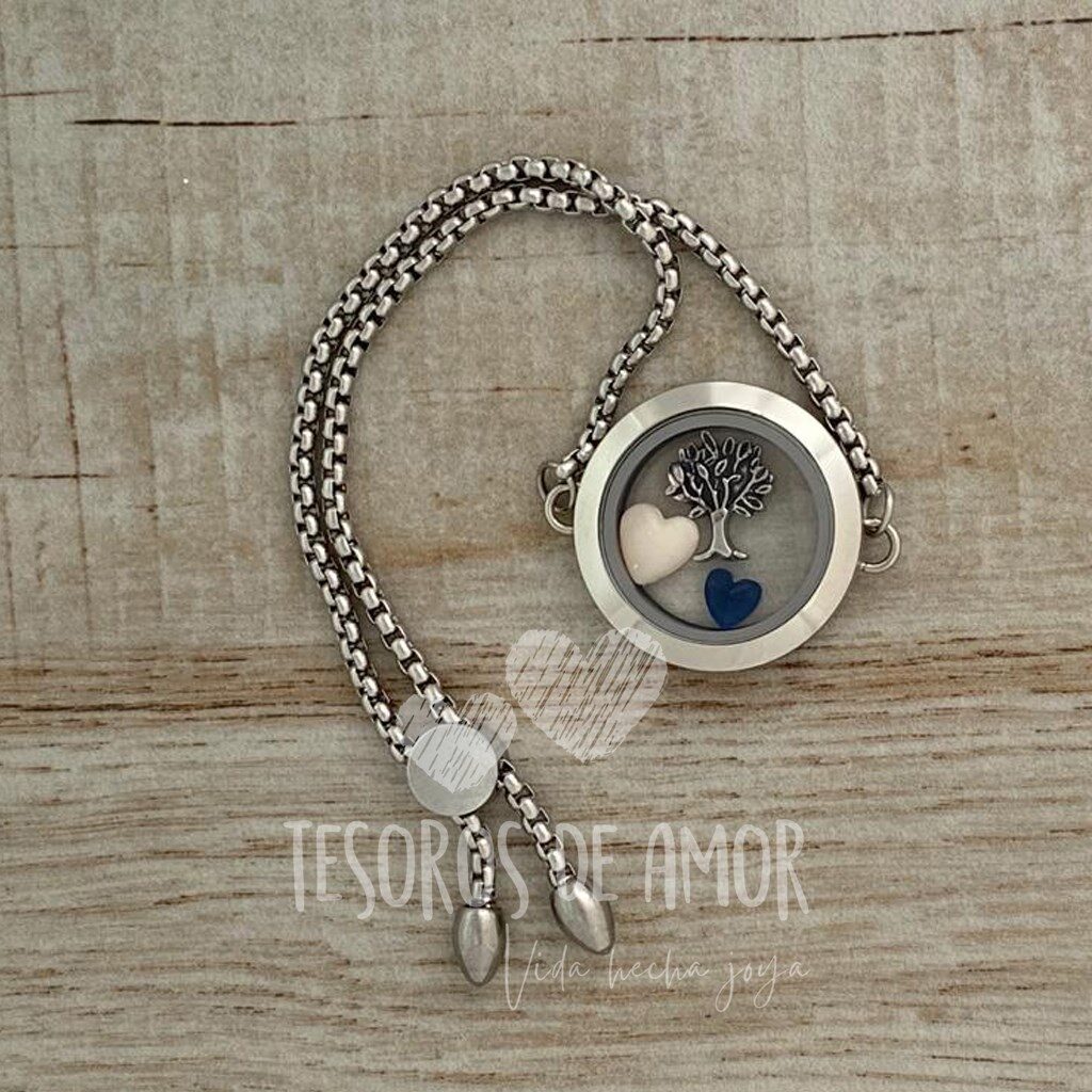 Relicario liso brazalete plata con figura “corazón” , pieza metálica plata “árbol” y figura “corazón” azul