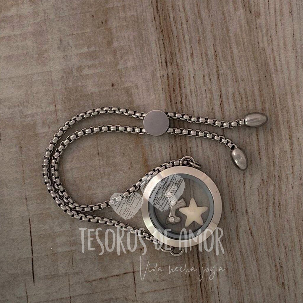 Relicario liso brazalete plata con figura “estrella” y pieza metálica plateada “perro con brillos”